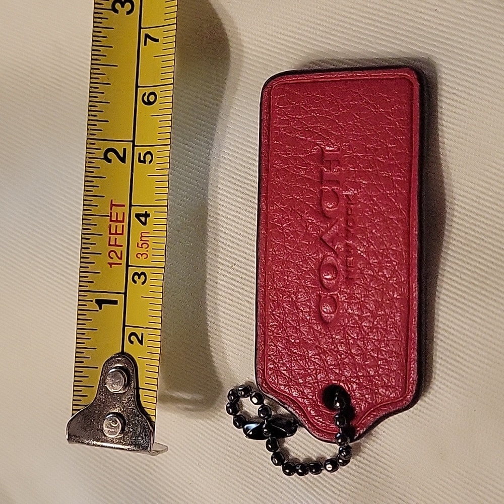 Coach Tag